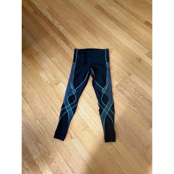 CW-X men’s Black Compression Leggings with Green Stitching - Picture 1 of 5